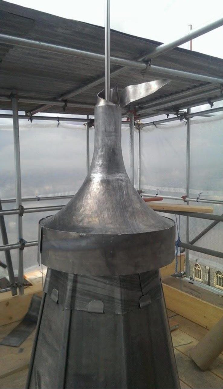 Lead spire finial formed on site