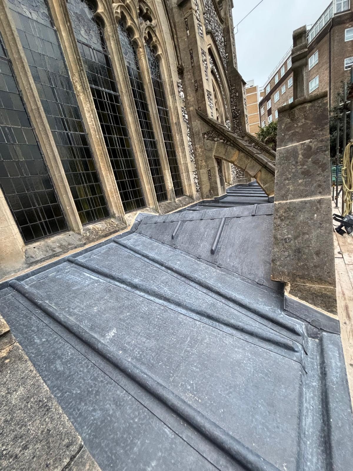 Lead parapet work on a church